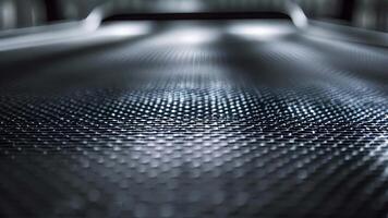 Closeup of the textured nonslip surface of a smart treadmill belt providing traction and stability for runners during intense workouts video