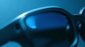 A closeup of the lenses of these smart sunglasses which are made of a special material that automatically adjusts the tint based on the lighting conditions. The frame is a simple blac video
