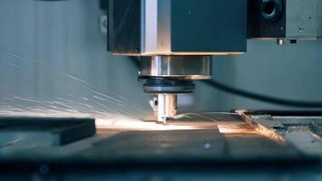 The assembly process starts with raw materials and gradually transforms them into a fully functioning product seen in the closeup of a machine ting and shaping metal components.. video