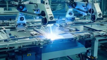 Automated arms moving swiftly and fluidly completing each task with precision.. video
