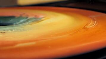 A closeup of the ink rollers coated in layers of vibrant colorful ink.. video