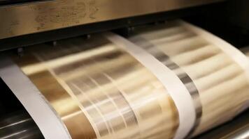 The satisfying clickclack sound of the press as it steadily churns out perfectly printed pages.. video