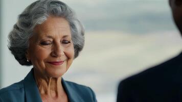 Despite her age a greyhaired leader shines with authenticity and empowers her team.. video