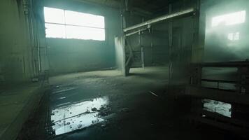The sound of dripping water echoes through the forgotten factory the only sign of life in this desolate place.. video