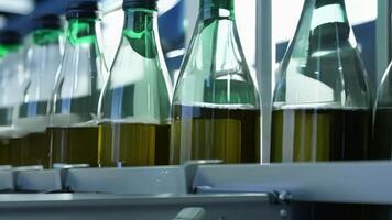The satisfying cling sound of empty bottles being automatically removed from the line.. video