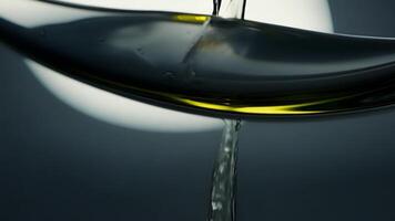 Thick viscous oil pours effortlessly from one container to another in a mesmerizing continuous flow.. video