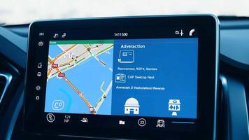 A close-up of a car's dashboard navigation system, highlighting advanced GPS technology. video