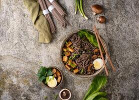 Soba noodle with tofu and mushroom photo