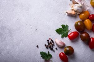 Assortment of different cherry tomatoes photo