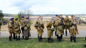 Historical Military Reenactment Scene. Horizontal photo. Minsk, Belarus - May 9, 2022 photo