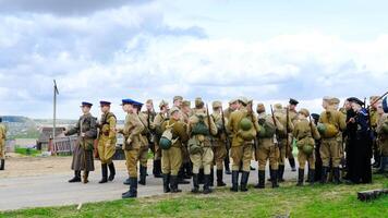 Group of Soldiers in Historical Military Reenactment. Minsk, Belarus - May 9, 2022 photo