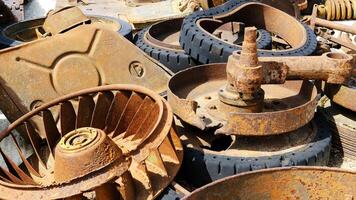 Rusty Scrap Metal Parts in a Junkyard photo