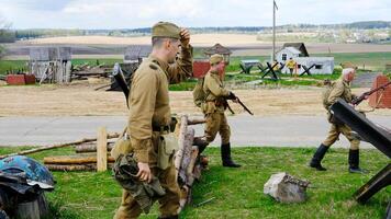 World War II Soldiers in Historical Reenactment. Minsk, Belarus - May 9, 2022 photo