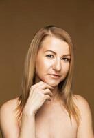 Confident Middle-Aged Woman with a Thoughtful Gaze, Portrait photo