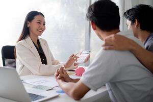 Gay Couple Planning Finances with Financial Advisor, Discussing Budget and Savings, LGBT Financial Planning, Modern Office Setting photo