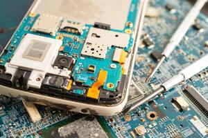 Repairing and upgrade circuit mainboard of notebook, electronic, computer hardware and technology concept. photo