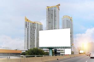 Blank template for outdoor advertising or blank billboards on city highways. Advertising concept, with clipping paths on screen. photo