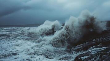 The ocean is rough and the sky is dark and cloudy photo