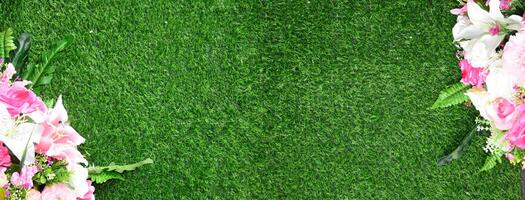 staircase green artificial grass with pink flower. Combination of plants, artificial grass. Beautiful wall photo
