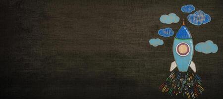 Concept Design For Creative Thinking. Back To School, Rocket Sketch On Blackboard. photo