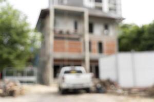 New home construction project with blurry and blurred empty room wall background without furniture photo