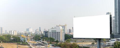 Mock up. Blank white billboard for advertisement on the residential area. Blank white billboard on city background. Panorama photo