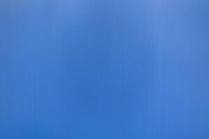 Corrugated plastic sheet or PP Flute Board. Blue background with stripe effect. photo