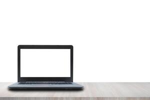 Laptop blank screen on wooden table isolated on white background. Can add background images and text photo