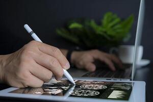 Businessman using tablet and checking stock market data. photo