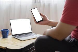 mockup image computer,cell phone blank screen for hand typing text photo