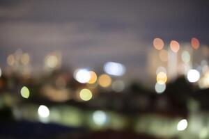 Bokeh abstract background of skyscraper buildings in Bangkok city photo
