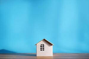 White paper house design isolated. The empty space can include advertising text. photo