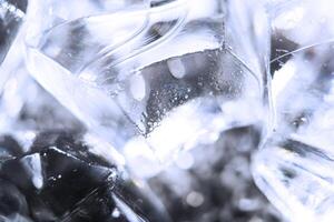 A close up of a pile of ice on a black background photo