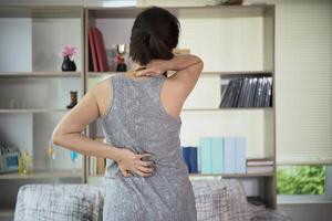 Spinal cord problems on woman's back. photo