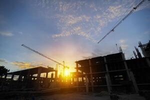 Investment in building construction concept. Construction site structure background And new multi-storey buildings Industrial background photo