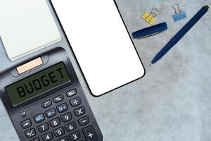 Top view of Calculator with word Budget photo