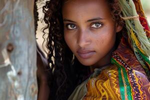 Ethereal beauty, young woman with striking eyes photo