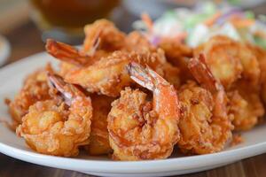 Crispy fried shrimp on a plate photo