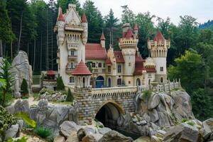 Enchanted fairy tale castle in lush forest setting photo