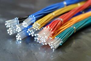 Multicolored fiber optic cables close up photo