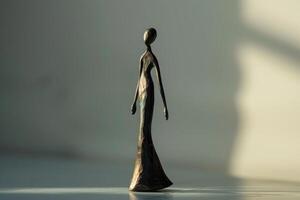 Elegant abstract figurine in soft light photo
