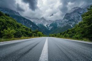 Majestic mountain view from an empty road photo