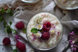 Fresh raspberry tapioca pudding in glass bowl photo