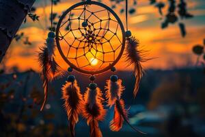 Dreamcatcher hangs gracefully with a vivid sunset backdrop, creating a tranquil summer evening scene photo