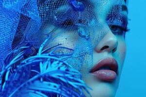 Futuristic beauty, woman in blue with abstract netting photo