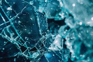Broken glass sparkling in the sunlight creating abstract pattern photo