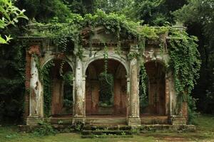 Enigmatic ruins overgrown by lush greenery photo