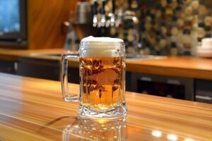 Refreshing glass of cold beer with frothy head sitting on bar waiting to be enjoyed photo