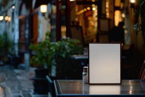Empty menu displaying on a table of a restaurant at night photo
