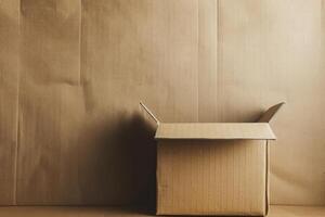 Empty cardboard box open on table with brown background photo